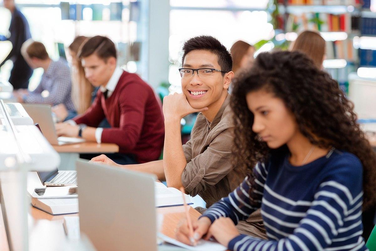 Students on laptops at a School-Based Health Center